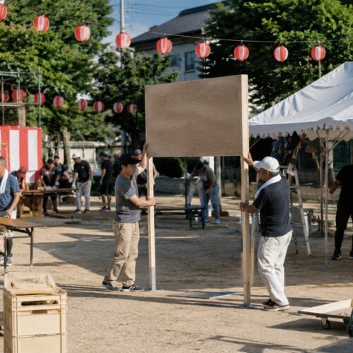 地域のお祭りの準備でそれぞれの役割を引き受ける人々